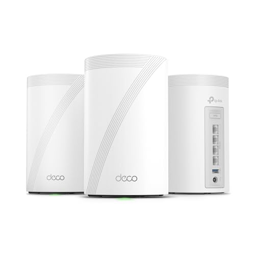 Three white TP-Link Deco mesh units, one showing Ethernet ports